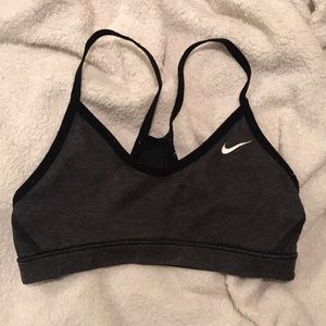 black and grey Nike sports bra